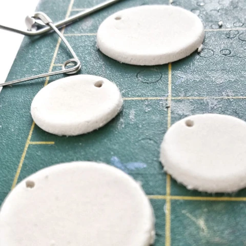 Use La Doll air dry clay to create beautiful boho earrings. Get the full tutorial in this post!